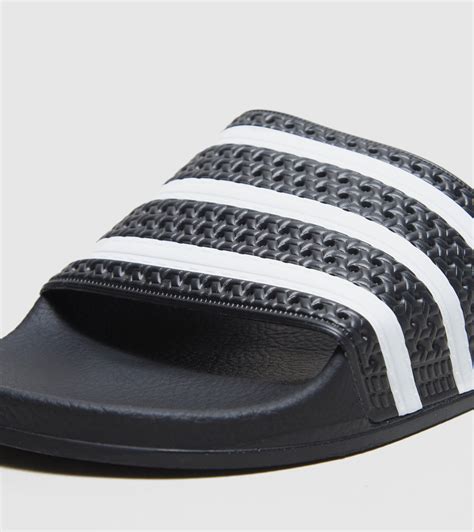 adidas adilette sandals fake|adidas adilette sandals price.